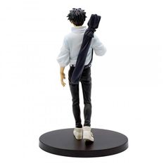 a figurine that is standing on a black base with a tie around it's neck