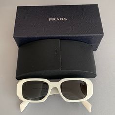 Authentic White Prada Sunglasses. Originally Bought From Sunglass Hut. Never Worn. Chic White Sunglasses For Formal Occasions, Elegant White Sunglasses For The Beach, Designer White Sunglasses For Formal Occasions, White Prada Sunglasses, Prada Sunnies, Prada Eyeglasses, Sunglasses Women Oversized, Prada Accessories, Grey Sunglasses