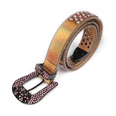 The Gold Strap Skull Buckle with Shiny Pink & Multi Rhinestone Belt is a striking and glamorous accessory that effortlessly blends edginess with a touch of femininity This belt is designed to make a bold statement, perfect for those who embrace a unique and expressive fashion style. The strap of the belt is crafted from a lustrous gold material that exudes opulence and sophistication. The shiny surface of the gold strap catches the light beautifully, adding a sense of luxury to the overall desig Fitted Rhinestone Belts For Party, Adjustable Rhinestone Party Belts, Y2k Rhinestone Belt, Studded Rhinestone Belt, Gold Studded Belt, Rhinestone Buckle Belt, Luxury Gold-tone Belt Buckles, Belt Store, Bling Belts