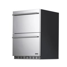 a silver refrigerator freezer sitting on top of a white counter next to a black drawer