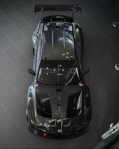 an overhead view of a black sports car