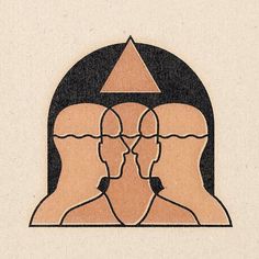 two people are facing each other in front of a triangle