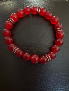 Red Jade beaded stretch bracelet Red Gemstone Beaded Bracelets, Elegant Red Stretch Bracelet With Gemstone Beads, Elegant Red Gemstone Beads Stretch Bracelet, Elegant Red Stretch Bracelet With 8mm Beads, Red Crystal Bracelet With Spacer Beads, Red Beaded Bracelets With Gemstone Beads, Elegant Red Hand-strung Stretch Bracelet, Red Hand-strung Casual Stretch Bracelet, Casual Red Hand-strung Bracelets