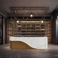 a marble counter in front of a wine rack