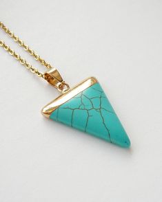 Turquoise Necklace Howlite Pendant Blue Gold Triangle Necklace for Women Gift Long Gold Turquoise Necklce Gemstone Triangle Pendant Necklace - Turquoise Hovlite gold plated pendant - Gold plated Chain Necklace Size of the pendant: about 25mm wide, 27-29mm long, 4mm thick MY SHOP: https://www.etsy.com/shop/BonBonStones Please contact me with any questions. I'm happy to help! Turquoise Pendant Crystal Necklace, Turquoise Pendant Crystal Necklace With Gemstone, Turquoise Gemstone Crystal Pendant Necklace, Turquoise Pendant Crystal Necklace Gift, Amazonite Jewelry, Amazonite Necklace, Gold Triangle, Triangle Necklace, Triangle Pendant