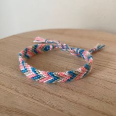 A Woven Bracelet Handmade With Blue, Pink, Green, And White Colors. 10 Bracelets For $25. Lava Rock Bracelet, Red Beaded Bracelet, Embroidery Bracelets, Turquoise Crystal, Woven Bracelet, Ball Bracelet, Pandora Style, Hinged Bracelet, Woven Bracelets