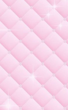 a pink wallpaper with diamonds and sparkles on it's edges, as well as the background