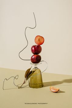 an apple sculpture sitting on top of a table