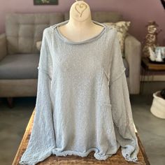 The Awesome Slouchy Light Blue Pullover From Three Birds Nest Is Slightly Sheer, Oversized, And Perfect For Layering. The Raw Edge Hem Is A Nice Boho Detail. I Purchased This Last Year And It Has Never Been Worn. Size Medium. 100% Polyester. Oversized Blue Top For Layering, Oversized Light Blue Cotton Sweater, Oversized Crew Neck Blouse For Layering, Light Blue Oversized Long Sleeve Sweater, Oversized Light Blue Long Sleeve Sweater, Light Blue Cozy Long Sleeve Tops, Oversized Light Blue Top For Fall, Oversized Light Blue Tops For Fall, Light Wash Relaxed Fit Long Sleeve Blouse