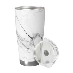 the white marble tumbler is next to an empty cup with its lid open and it's lid closed