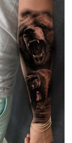 a man's arm with two bears on it and one bear in the middle