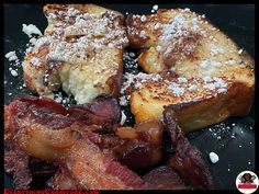 french toast with bacon and powdered sugar on the top is ready to be eaten