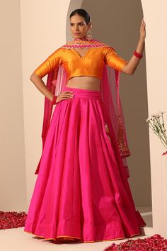 Hot pink solid lehenga crafted in tafetta silk with statement tassels. Paired with a blouse and gota lace bordered dupatta.
Components: 3
Pattern: Embroidered
Type Of Work: Gota lace
Neckline: V Neck
Sleeve Type: Elbow
Fabric: Lehenga and Blouse: Tafetta Silk, Dupatta: Soft Net
Color: Pink
Other Details: 
Length:
Lehenga: 40 inches
Dupatta: 2.5 mtrs
Dupatta width: 44 inches
Occasion: Mehendi and Haldi - Aza Fashions Saree Set With Tassels For Wedding, Floor-length Wedding Sets With Tassels, Festive Wedding Sets With Tassels, Anarkali Set With Tassels For Wedding, Festive Anarkali Set With Tassels For Wedding, Anarkali Wedding Set With Tassels, Bollywood Saree With Tassels For Wedding, Festive Wedding Anarkali Set With Tassels, Fitted Sets With Tassels In Traditional Drape