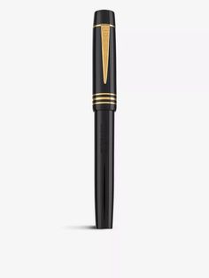 a black pen with gold trim on it