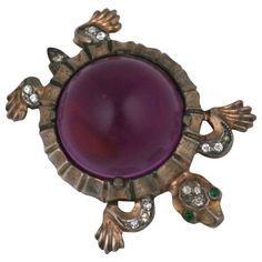 Rare gold washed sterling silver Trifari purple lucite Jelly Belly brooch. Retro style with emerald cabochon eyes and crystal pave, 1940's. 1.50" L,1.25" W Reselling Jewelry, Trifari Brooch, Turtle Brooch, Trifari Jewelry, Belly Jewelry, Costume Earrings, Gold Gemstone Ring, Jelly Belly, Jewelry Antique