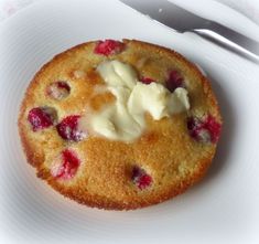 a small dessert on a white plate with a fork