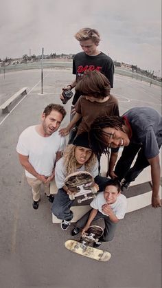 a group of young people standing around each other