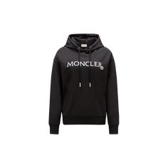 A Moncler classic, this hoodie is embellished with an embroidered logo across the chest. The loose fit sweatshirt is crafted from lightweight jersey and fleece. Casual Sweatshirt With Appliqué Logo For Fall, Luxury Cotton Hoodie Sweatshirt, Luxury Black Sweatshirt With Embroidered Logo, Luxury Hooded Sweatshirt With Ribbed Cuffs, Luxury Hoodie Sweatshirt, Luxury Sweatshirt With Drawstring Hood, Luxury Hoodie With Drawstring Hood For Streetwear, Luxury Streetwear Hoodie With Logo Detail, Luxury Hoodie With Logo Detail