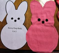 bunny peep body cut out on a table next to scissors and other crafting supplies