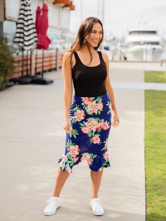 Hey there fashion lovers! Are you ready to add some fresh prints to your wardrobe? Our new Patterned Ruffle Hem Pencil Skirt is just what you need! This beautiful skirt will give your outfit a pop of color and flowy movement that will make you feel like a fashion icon. Pair it with a basic tee, jean jacket, and booties for a stylish and effortless look that will turn heads. Whether you're going out with friends or running errands, the Patterned Ruffle Hem Pencil Skirt is perfect for any occasion Beautiful Skirt, Maxi Skirt Dress, Graphic Apparel, Beautiful Skirts, Fashion Icon, Knee Length Dresses, Hey There, Knee Length Skirt, Romper Pants