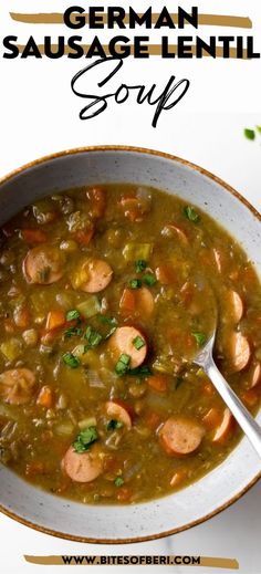 a bowl of soup with sausage and lentils in it on a white table top