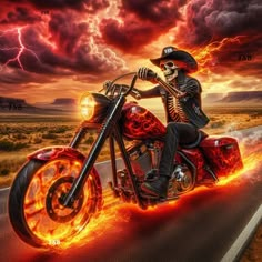 a skeleton riding on the back of a motorcycle with flames coming out of its tires