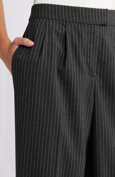 Crisp pleats structure these workday pants designed with leg-elongating vertical creases and wide legs. Zip fly with hook-and-bar closure Side-seam pockets; back welt pockets 65% polyester, 33% rayon, 2% spandex Machine wash, tumble dry Imported Pinstripe Wide Leg Pants For Work, Wide Leg Pinstripe Pants For Work, Pinstripe Office Bottoms With Belt Loops, Pinstripe Wide Leg Bottoms For Workwear, Pinstripe Wide-leg Workwear Pants, Pinstripe Wide-leg Pants For Workwear, Pleated Wide Leg Pants, Pants Design, Wide Legs