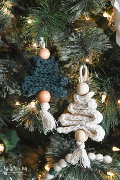 crocheted ornaments are hanging on the christmas tree