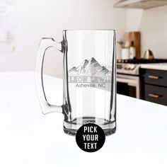 a glass mug sitting on top of a counter