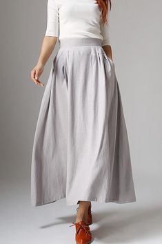 Giving an elegant vision of our this maxi skirt. The gray skirt made from soft linen fabric in an a line shape. The summer skirt finished with two seam pockets and with pleating details throughout.DETAIL* 50% linen, 50% Cotton* Hide zipper in the right side* Two pockets on each side* Maxi linen skirt for summer, spring Elegant Gray Maxi Skirt For Spring, Gray Flowy Maxi Skirt For Summer, Gray Relaxed Fit Maxi Skirt For Summer, Gray Long Skirt For Summer, Pleated Linen A-line Maxi Skirt, Linen A-line Maxi Skirt With Pleats, Linen A-line Pleated Maxi Skirt, A-line Linen Maxi Skirt With Pleats, A-line Linen Pleated Maxi Skirt