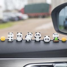 PRICES MAY VARY. DURABLE MATERIAL: Made of high quality resin, these mini car interior decorations are built to last through everyday driving and temperature changes. UNIQUE CAR ACCESSORIES: Spice up your ride with these cute car accessories - a fun and affordable way to customize your vehicle's look. ADORABLE DECOR: This set includes 6 or 8 mini resin pandas and oranges as cute car dashboard decorations for fun interior accents. BRIGHTEN YOUR COMMUTE: Their cheerful designs are sure to bring a Cute Car Dashboard, Car Mirror Decor, Cute Car Interior, Dashboard Decorations, Kawaii Car, Fun Interior, Car Mirror Decorations, Car Rearview Mirror Accessories, Mirror Accessories