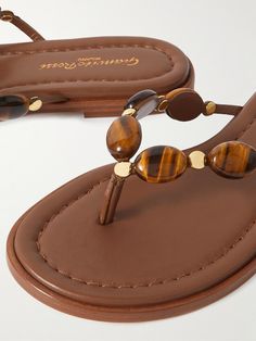 Find GIANVITO ROSSI Shanti Embellished Leather Thong Sandals on Editorialist. Shop GIANVITO ROSSI Shanti embellished leather thong sandals, Explore the latest GIANVITO ROSSI women's collection Leather Thong Sandals, Brown Sandals, Gianvito Rossi, Thong Sandals, Women Collection, Sandals, Luxury Fashion, Leather