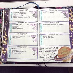 an open planner book with writing on it