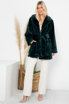 Indulge in luxurious style with our Emerald Green Faux Fur Belted Long Sleeve Coat. The deep emerald green color adds a regal touch while the faux fur and belted waist provide both warmth and a flattering silhouette. Elevate your outerwear game with this premium coat. Regular Size Coat Long Sleeves High Quality Faux Fur Waist Self Belt & Pocket Open Front & Fully Lined Model Size: Height: 5'10 / Bust: 34" / Waist: 24" Model Is Wearing Size: Small Bust: 41" Length: 34" Brand Size Dress Bust Waist Winter Green Belted Outerwear, Green Outerwear With Belted Cuffs And Long Sleeves, Green Long Sleeve Outerwear With Belted Cuffs, Green Faux Fur Trim Coat For Fall, Green Fur Coat With Faux Fur Trim For Fall, Green Faux Fur Coat With Faux Fur Trim, Green Faux Fur Coat For Fall, Winter Belted Faux Fur Coat, Winter Faux Fur Belted Coat