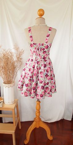 "DHL shipping upgrade is available at check out process. Shipping part by DHL will take 3-6 days only. It costs USD13 in addition from standard shipping cost. ♥ ITEM DESCRIPTION Cute cotton floral printed dress perfect for holiday picnic or tea party. Listing not including any accessories. ✄ MATERIAL ✄ *Cotton *Lining material ✄S I Z E ✄ XS Bust:30-32\" Waist\" 25-26\" Hip:Free Lenght:33\" Ƹ̵̡Ӝ̵̨̄Ʒ♥ Matching pearl necklace/ affordable jewelry CLICK=> https://www.etsy.com/shop/Amordress?sectio A-line Rose Print Dresses For Garden Party, Pink A-line Sundress For Garden Party, Pink A-line Dress With Rose Print, Fitted Cotton Dress With Rose Print, Cotton Rose Print Dress For Garden Party, Retro Party Dress, Floral Dress Vintage, Vintage Sundress, Floral Printed Dress