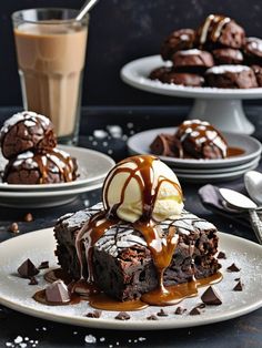 chocolate cake with ice cream and caramel drizzled on top, surrounded by other desserts