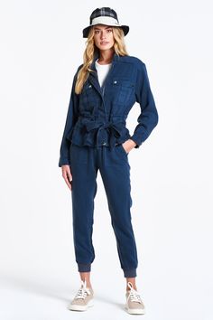 Drop shoulder jacket with front patch pockets and cinched waist. Versatile jacket for anywear is a MUST add to wardrobe! Solid color woven on relaxed fit.Body length from HPS: 23 1/2", Sleeve length: 22", Bust: 44" (Size Small) 100% TENCEL Machine wash cold, Tumble dry low Imported Denim Blue Utility Jacket With Pockets For Fall, Fall Washed Blue Utility Jacket, Washed Blue Long Sleeve Utility Jacket, Washed Blue Utility Jacket For Fall, Denim Blue Utility Jacket With Patch Pockets For Work, Fall Utility Jacket In Washed Blue, Blue Long Sleeve Utility Jacket With Pockets, Fall Washed Blue Utility Jacket For Work, Blue Outerwear With Cargo Pockets And Long Sleeves