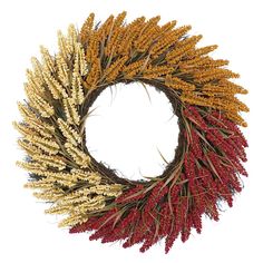 a dried wreath with red, yellow and white flowers on the front is isolated against a white background