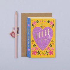 a greeting card with a pencil next to it