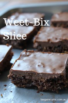 chocolate brownies with frosting sitting on top of a baking sheet in front of the words weet - bix slice