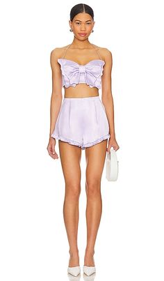 Find MAJORELLE Siren Top In Lavender on Editorialist. MAJORELLE Siren Top in Lavender. - size S (also in M, XXS) MAJORELLE Siren Top in Lavender. - size S (also in M, XXS) Unveiling the MAJORELLE Siren Top in a dreamy Powder Purple shade. This satin crop top is designed for playful charm, featuring a flattering halterneck styling. Paired with matching shorts, it creates a cohesive and girly ensemble that's perfect for embracing the warm weather.. 97% polyester 3% elastane. Made in China. Hand wa Siren Top, Satin Crop Top, Romantic Escapes, Satin Fabric, Warm Weather, Top Brands, Lavender, Crop Top, Angeles