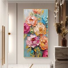 a painting on the wall with flowers in it