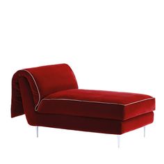 a red chaise lounge chair with white piping