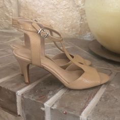 Brand New. T Strap Leather Upper. 3 1/2” Heel. Color - Sand Elegant Adjustable T-strap Heels, Beige T-strap Heels For Spring, Spring Beige T-strap Sandals With Single Toe Strap, Beige Leather T-strap Heels, Tan Leather T-strap Sandals, Beige Leather High Heel T-strap Sandals, Beige Leather Open Toe T-strap Sandals, Gianni Bini Shoes, Gianni Bini