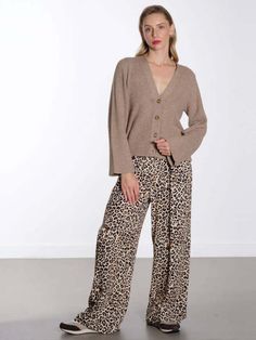 Feel comfort and style with the leopard pants by marta. these pull-on trousers are made from a light weight viscose with an elasticated waistband and wide leg. perfect for the summer months wear them with a vest and sandals.    model wears a size s/m.    details    - leopard print pants  - high-waisted  - elasticated waistband  - side pockets  - wide leg  - relaxed fit  - lightweight fabric  - pull on    fabric   care    composition: 100% viscose.    care: 30c machine wash. iron on a medium heat. do not tumble dry. Casual Wide Leg Viscose Pants For Fall, Casual Viscose Wide Leg Pants For Fall, Leopard Print Wide Leg Bottoms With Relaxed Fit, Casual Leopard Print Wide-leg Pants, Casual Wide-leg Leopard Print Pants, Leopard Print Wide Leg Loungewear Pants, Fall Wide Leg Viscose Bottoms, Leopard Print Loungewear Pants With Elastic Waistband, Fall Leopard Print Bottoms With Elastic Waistband