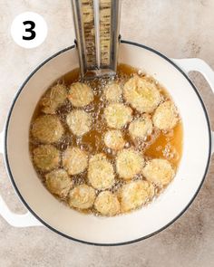 an overhead view of food being cooked in a saucepan with the words 3 on it