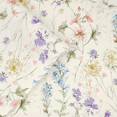 an image of a flowery fabric with many colors and flowers on it's side