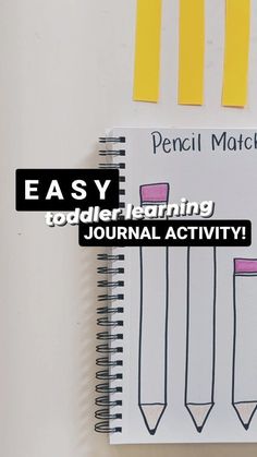 a spiral notebook with pencils on it and the words easy toddler learning journal activity