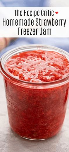 the recipe for homemade strawberry freeze jam is in a glass jar on top of a counter