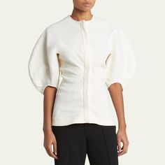 Proenza Schouler "Reagan" top in eco stretch linen-blend Crew neckline; concealed button front 3/4 puff sleeves Slim fit Linen/viscose/elastane Dry clean Made in Italy Spring Fitted Puff Sleeve Top With Structured Shoulders, Fitted Puff Sleeve Top With Structured Shoulders For Spring, Versatile Fitted Puff Sleeve Blouse, Versatile Fitted Blouse With Puff Sleeves, Fitted Linen Tops For Workwear, Modern Blouse With Gathered Sleeves For Spring, Modern Spring Tops With Structured Shoulders, Modern Tops With Structured Shoulders For Spring, Linen Puff Sleeve Tops For Daywear